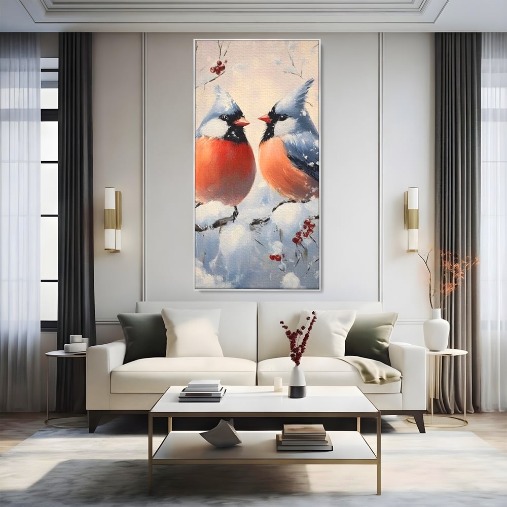 Tablou canvas cu tablou canvas cu doi pasari cardinali in iarna, in rama de aluminiu argintiu, pe perete intr-un living